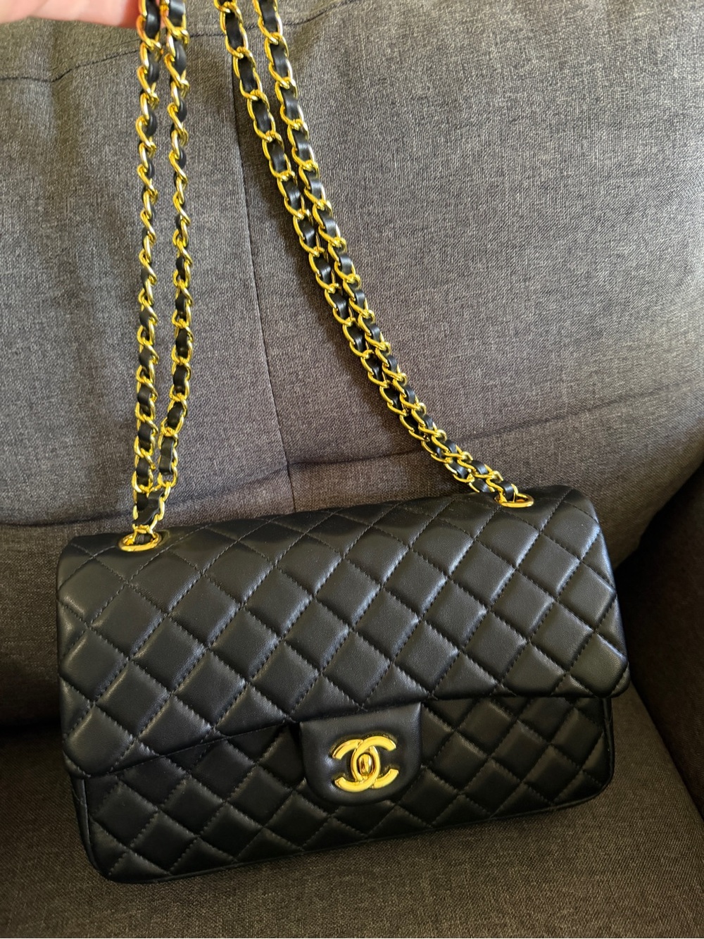 CHANEL Black Quilted Shoulder Bag with Gold Chain
with dust bag. No Box